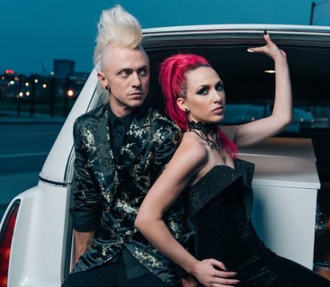 On the left is Shawn Jump, the duo's guitarist, and on the right is vocalist Ariel Bloomer. The two are the members of Icon for Hire.