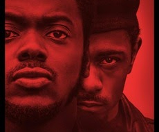 Lakeith Stanfield as Bill O’Neil standing behind Daniel Kaluuya as Fred Hampton.