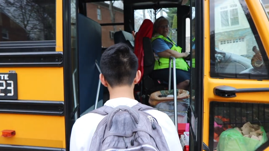 Early in the morning, a student steps onto the only bus serving Arlington students going to Jefferson