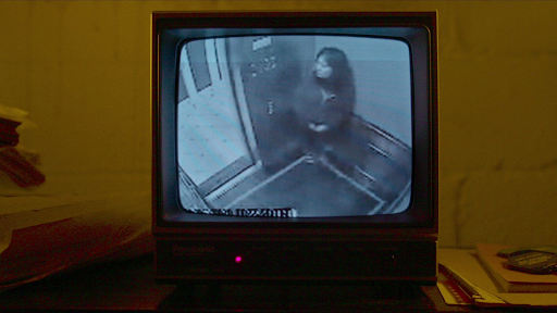 The last footage of Elisa Lam on a CRT television set.