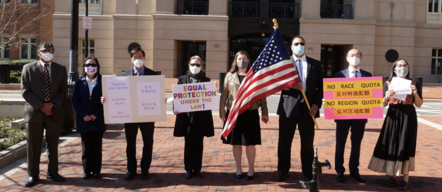 Members of the Coalition for TJ and the Pacific Legal Foundation stand outside the Albert V. Bryan Courthouse in Alexandria after filing a lawsuit against FCPS