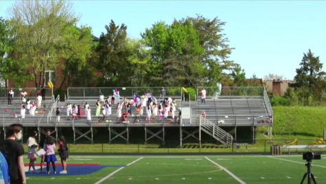 Students gather on the bleachers, waiting for a pep rally to begin on Apr. 17.