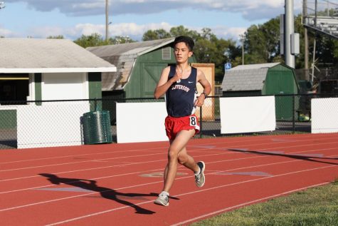 Junior Eugene Gonzalez competes at a meet against Falls Church High School and John Lewis High School on Wed., May 12, 2021.