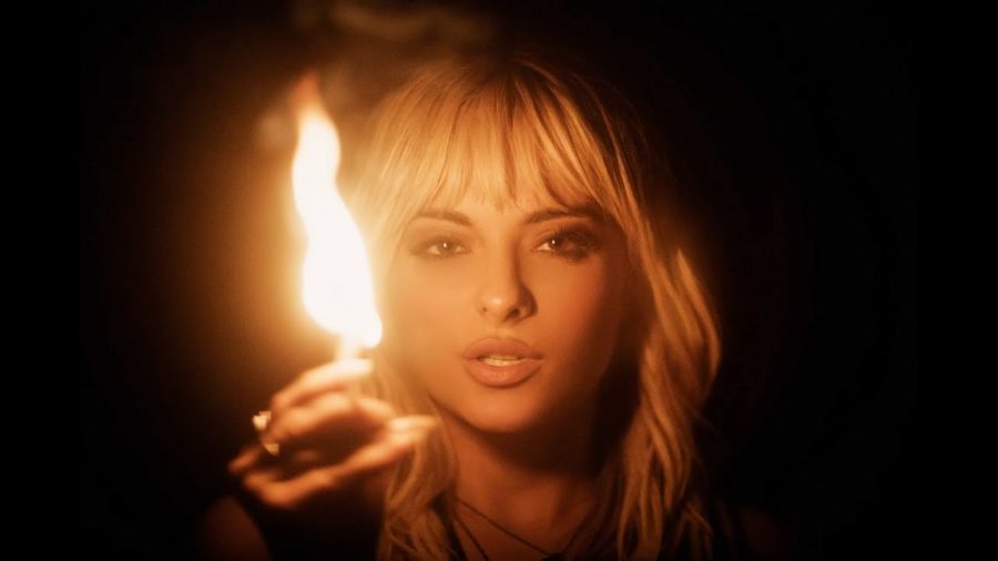 "Sabotage," a track on Rexha's new album, discusses the harmful impact self-doubt and anxiety had on the artist, comparing the feeling to burning bridges.