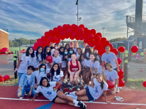 Celebrating the seniors, both junior varsity and varsity field hockey players pose for a team photo.
