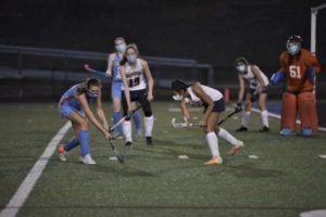 Senior Nora Fareeha and sophomore Nina Garces defend their goal in a junior varsity field hockey game against Marshall High School on Mar. 10, 2021.