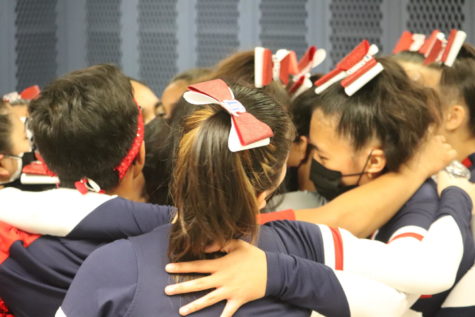 The Jefferson cheer teams celebrates the triumphant season. “I am really proud of the team this year,” captain and flyer Grace Guan said. 
