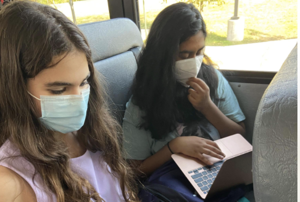 Loudoun students study on the long bus ride back home. "I feel really lucky about my bus. It's such a small thing that can affect students so much," freshman Nishita Paruchuri says.