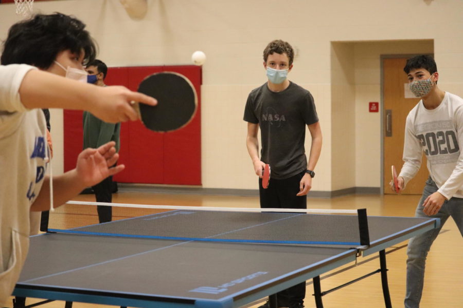 During the ping pong tournament hosted by Jefferson’s SGA, Rick Yoon serves the ball to partners Josh Golden and Hudson Keeler. “In between points I focus a lot on my partner and my team—what’s our strategy, what are we thinking about, how are we going to deal with everything, but in the middle of the point, I’m not thinking about anything,” Golden said. “Everything simplifies down to the ball, your paddle, and their paddle.” 

