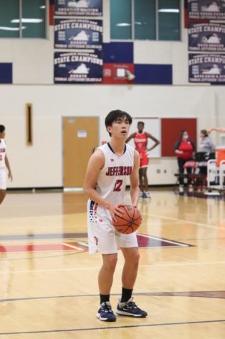Focused on the net, senior and captain Steven Li lines up to take a free throw. Over the last few games of their season, Li has dominated the court. “There’s never a time when Steven’s on the floor that hes not giving his best effort,” head coach Mark Grey-Mendes said. 
