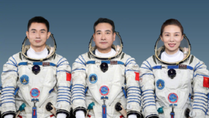 From left to right: Zhigang Zhai, Guangfu Ye, and Yaping Wang sit side by side. They are the current taikonauts in China’s space mission, and will be the ones answering questions and responding to video submissions.