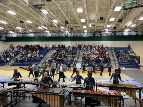 Thomas Jefferson’s Winter Drumline (TJDL) performs their show, CounteR, at Woodgrove High School. For the past winter, TJDL has choreographed and rehearsed their routine, always striving to improve with their instructors. “We work well with both of our body instructors; one focuses on movements without the drums, and one focus with the drums,” senior Ryan Payne said. 