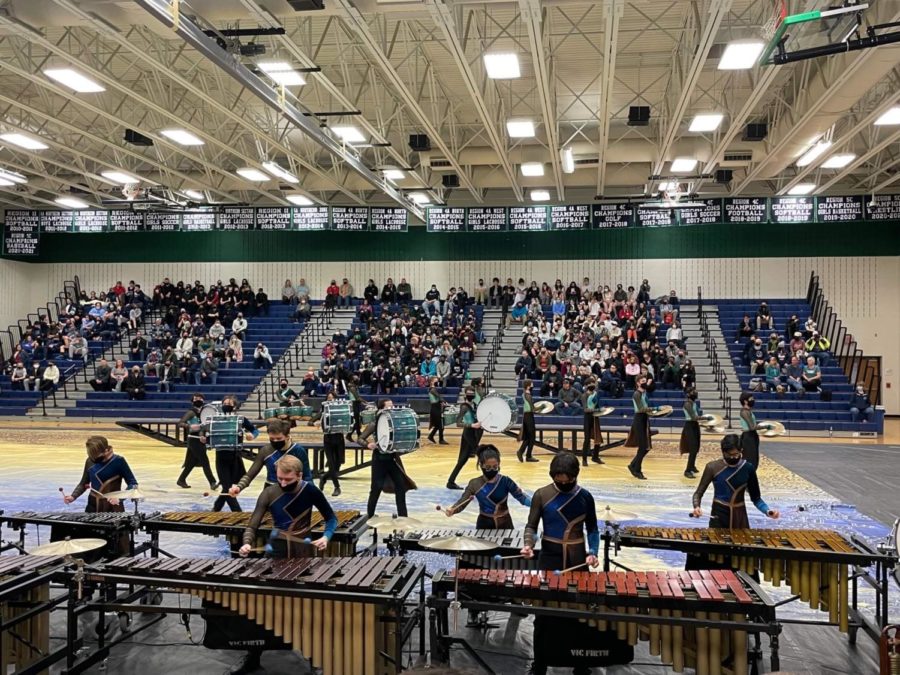 Thomas Jefferson’s Winter Drumline (TJDL) performs their show, CounteR, at Woodgrove High School. For the past winter, TJDL has choreographed and rehearsed their routine, always striving to improve with their instructors. “We work well with both of our body instructors; one focuses on movements without the drums, and one focus with the drums,” senior Ryan Payne said. 