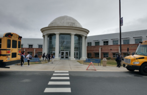 Jefferson students walk to the buses after a long day of school. Due to U.S. District Judge Claude Hilton’s ruling on the new Jefferson admissions process, it is uncertain how new students will be selected to join Jefferson.