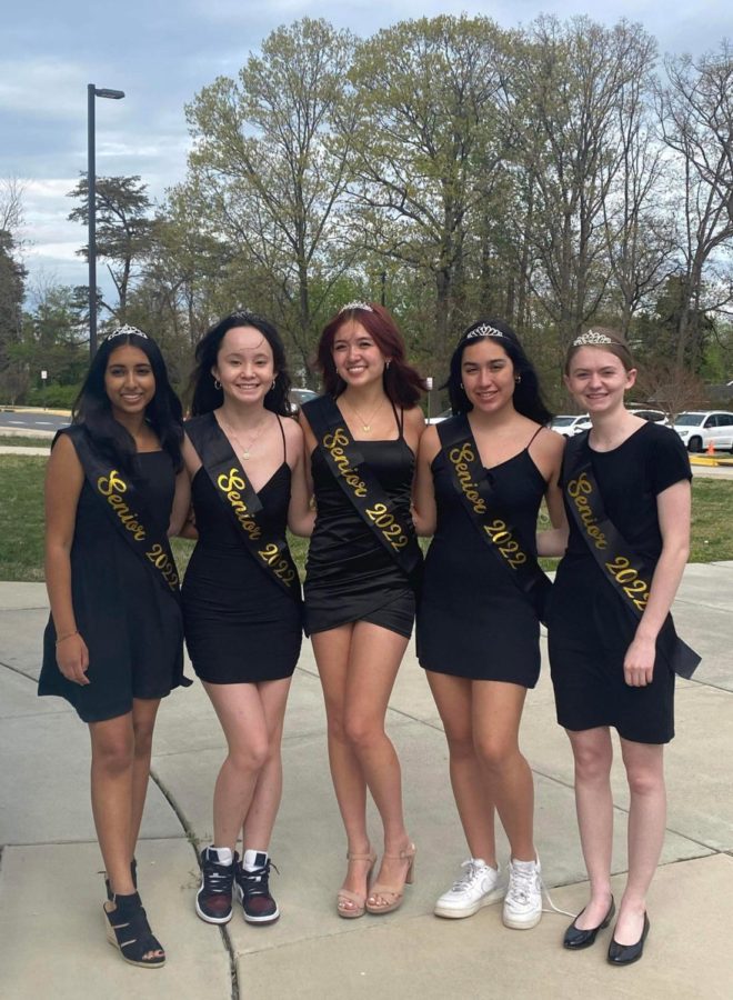 As part of the girls lacrosse senior night, seniors (from left to right) Ananya Chilakamarri, Sophia Suganuma, Christine Franklin, Erika Ramirez-Sanglade, and Emily Hollinger are recognized for their time on the team and given sashes. They are wearing their black dresses, ready to celebrate. “This day is all about the seniors, and celebrating how far they’ve come. It’s really fun to see all of them,” sophomore Sinead Molony said.