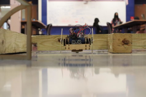 This year’s robot competition removed the beauty component from previous years and tested only mechanical capabilities. A robot maneuvers through the eight foot square maze trying to avoid any walls whilst also completing tasks to earn points. 