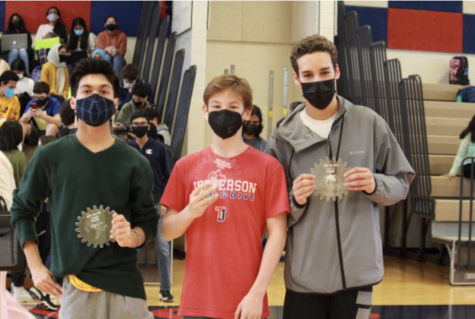 Winners Kritagya Khadka, Ryan Wells, and Nabil Elakari (left to right) pose with their awards after the showcase.