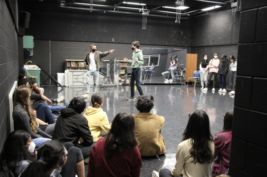 TJ+Theater+Arts%E2%80%99+Ryan+Lien+points+to+Aiden+Zurcher+to+demonstrate+for+the+improvisation+workshop+as+students+gather+around.+%E2%80%9CI+really+enjoyed+the+improvisation+workshop%2C+and+I+thought+it+was+really+cool%2C%E2%80%9D+freshman+Asha+Das+said.