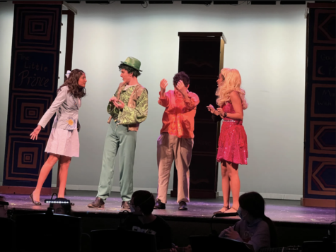 Seniors Sarina Saran, Aafreen Ali, and Jack Baisch and junior Gabriel Ascoli rehearse for their performance Wednesday Apr. 27. Saran plays Matilda as she confronts her family, the Wormwoods, played by Ali, Ascoli, and Baisch. "[Matilda]'s really smart ... she is mistreated a lot but she likes to stand up for what is right," Saran said.