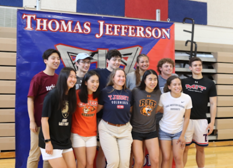 The 10 athletes pose for a picture, in their college shirts, at the NCAA signing ceremony, with athletic director Ms. Murphy. The athletes were Josh Park, Michael Zhang, Will Kohn, Annika Topchy, Gavin Cramer, Hilal Hussein, Ashley Lee, Eleanor Kim, Lexi Sung, and Andrea Silva (in order from left to right, top row before bottom row). “The thing I loved about the TJ Signing Day was that it felt really personal, like they cared about you a lot and the time that we spent at TJ being student athletes,” Silva said. 
