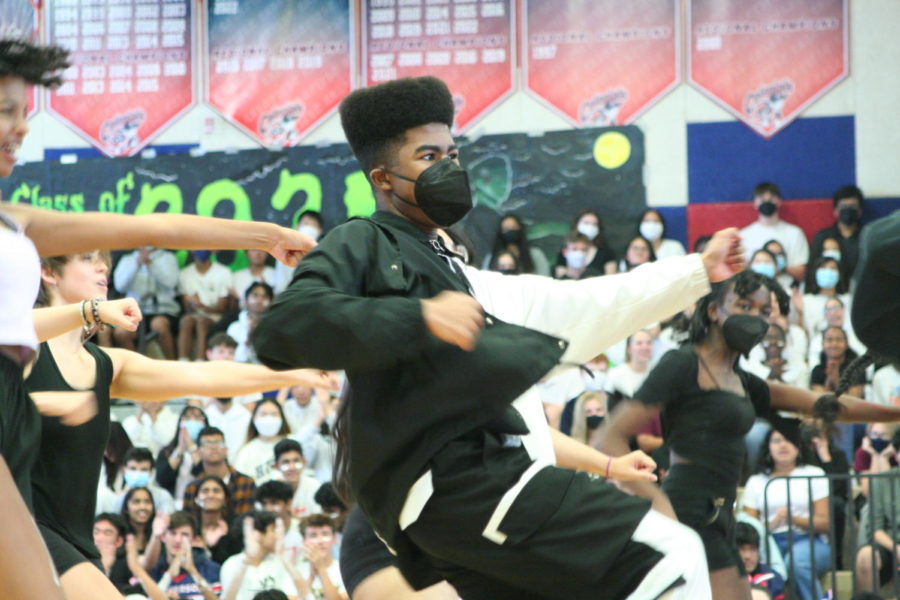 Kai Bilal performs during the sophomores' MEX dance despite struggles with boys building interest and participation. "The initial demo seemed kind of hard," sophomore Zeerak Yusufi said. "It was fast paced and the [guys] just lost interest. There were no friend groups, either—it was just random people who decided to come to MEX, so there was no hype. We [didn't] generate enough interest."