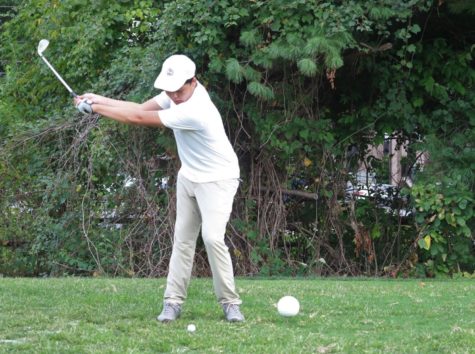 Senior Nathan Cheng swings his golf club in the seventh hole of Jefferson’s senior night golf game. He took four strokes that hole, bringing his total score to 41 in the nine-hole game. “The best memories have been bantering and hyping each other up, since we have to make sure that we’re all in a good mood during games. Winning is also always fun, and we’ve been winning this year for sure,” Cheng said.