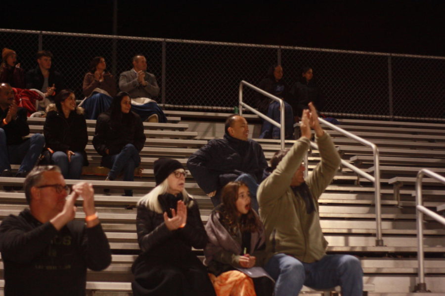 The+audience+cheers+as+the+first+touchdown+of+the+game+is+made+by+the+Colonials.