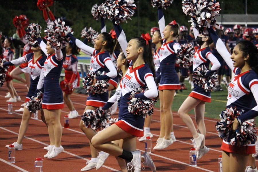 Jefferson cheer performs at the senior night football game on Oct. 21. “Senior night was our last cheer performance at a football game,” Challa said. “It was super fun and we all had a great time.” 