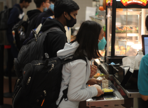 Caption: Students line up to get food from the Jefferson cafeteria. "[This policy is] mostly behind the scenes, we're trying to eliminate some food waste is all," junior and Treasurer Matt Sprintson said.

