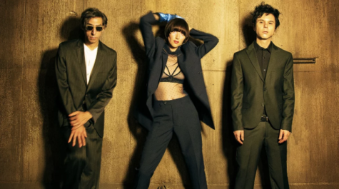 The Yeah Yeah Yeahs (Brian Chase, Karen O, and Nick Zinner, left to right) pose in a promotion for their new album “Cool it Down.”