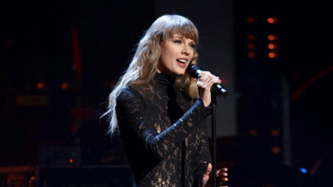 Taylor Swift performs Carole King's "Will You Love Me Tomorrow" at the Rock and Roll Hall of Fame. 