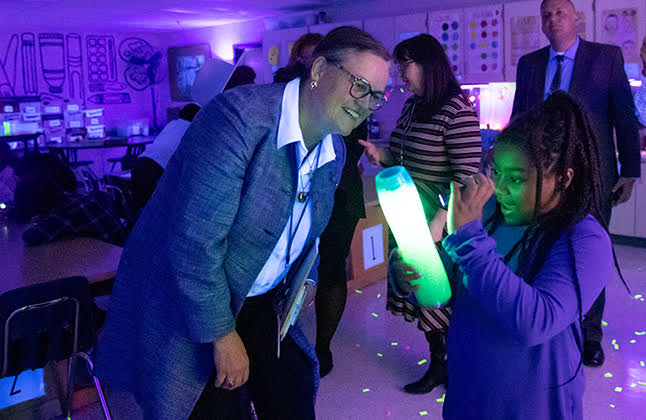 Superintendent Michelle Reid tours an elementary school as part of her research process for the county's strategic plan.
