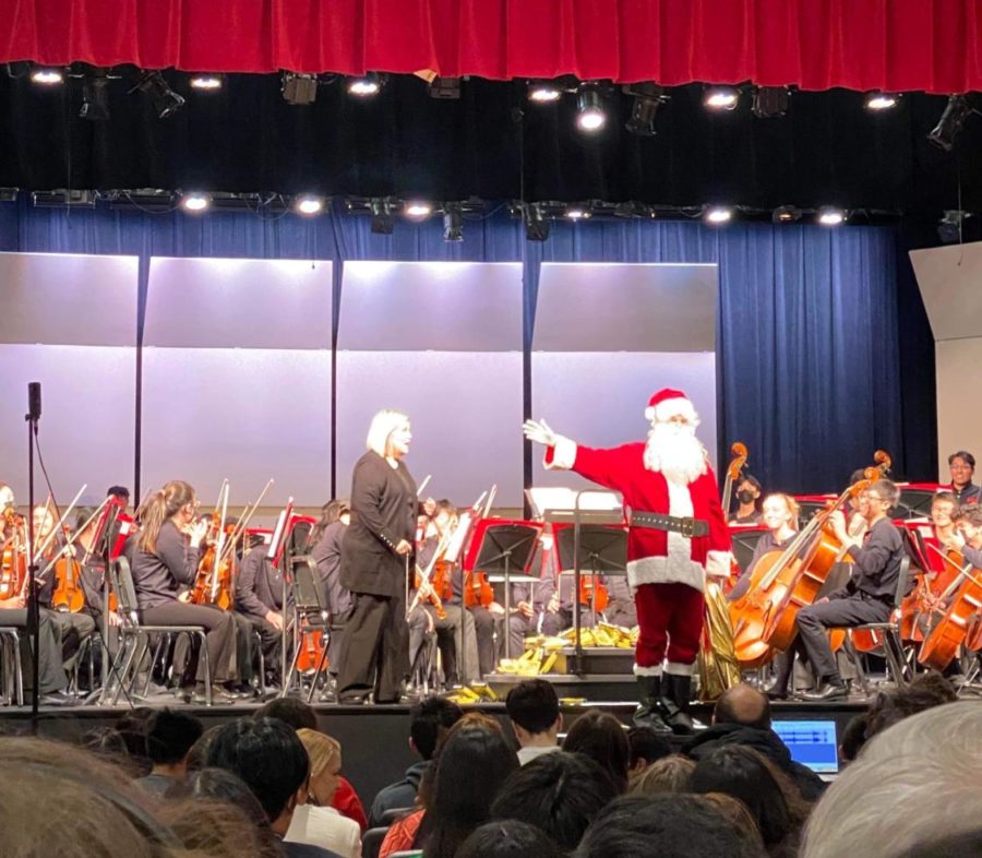 Near the end of the concert, a parent dressed as Santa joins the students on stage during “Sleigh Ride”. “He came up with this idea because it's right after the holidays, and then it's a winter concert. We're still in the Christmas spirit,” TJ Orchestra Boosters fundraising chair Chihyon Yi said. 
