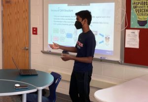 During 8th period, Machine Learning Club captain and senior Sauman Das lectures on generative adversarial networks, a model used in machine learning. “We’re trying to teach more application based machine learning and how to get started with research,” Das said. “We’re also making sure were talking about current advances in machine learning, like AlphaFold.”