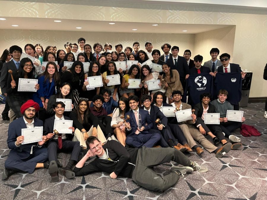 Getting together on the final day of NAIMUN, the Model United Nations club members display their individual awards. Despite claiming many awards, including Best Large Delegation overall, taking 60 students to a conference wasn’t ideal in the beginning. “Delegation awards are proportion based, so you take 60 kids and it’s definitely hard to get recognition at such a high level,” Jain said. 