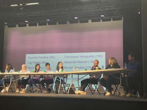 The student and staff panelists express their ideas for innovative solutions to school issues. The goal wasnt just for us to answer the questions, but for us to have a discussion with each other while the crowd of faculty in the audience listened, junior panelist Alex Reichel said. 
