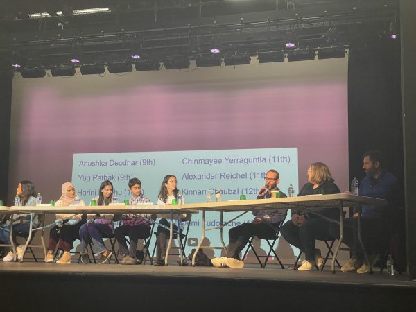 The student and staff panelists express their ideas for innovative solutions to school issues. "The goal wasn't just for us to answer the questions, but for us to have a discussion with each other while the crowd of faculty in the audience listened," junior panelist Alex Reichel said. 