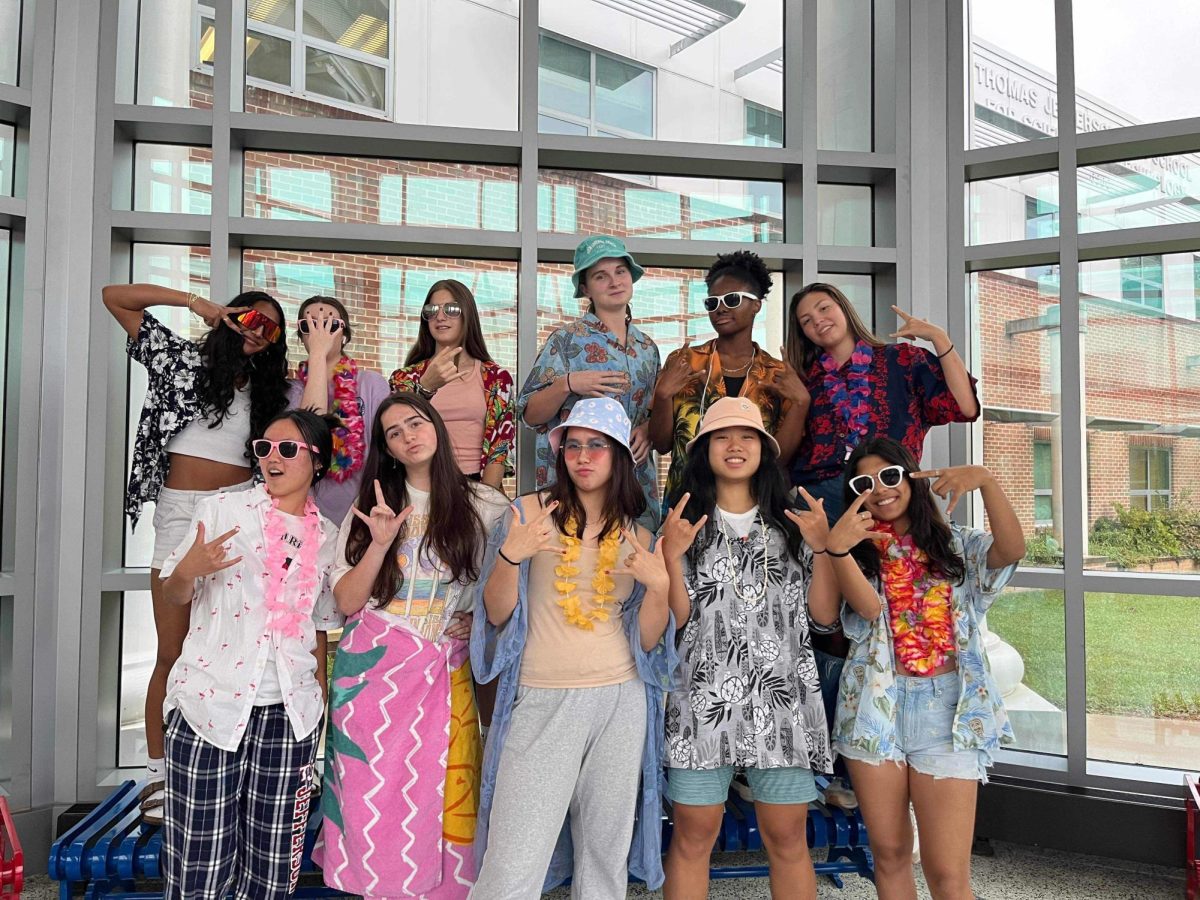 Posing in the Dome for Beach Day, varsity always brings their best when
it comes to spirit days. “We’ve always had a lot of participation to the
point where if you don’t participate, you’re left out. It’s almost embarrassing not to participate,” junior Reva Galagali said.