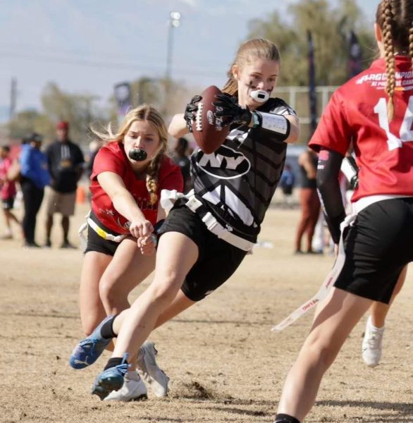 In a Nationals flag football game, Clayton makes a run for the end zone. The Virginia Hurricanes–the team Clayton plays flag football for–made Nationals several times. I joined them, and I played for the past three years,” Clayton said. ”Weve gotten to Nationals the past few years. We were finalists, semi-finalists, and then quarter-finalists this year.”