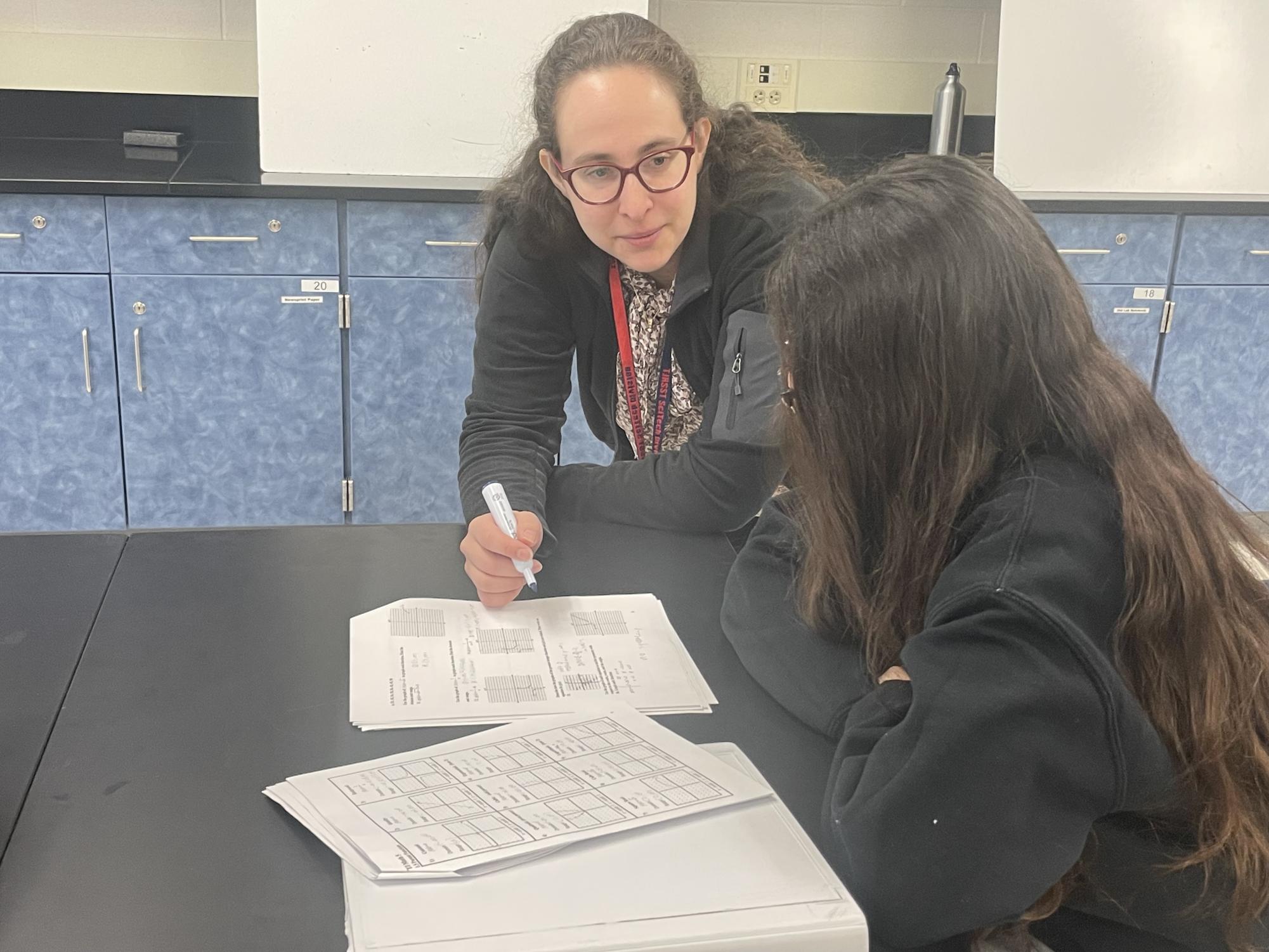 Physics teacher Elissa Levy helps sophomore Maria Yayloyan with her homework during advisory. Students should always feel free to reach out to other teachers if theirs is not available. “Reaching out to teachers is important because teachers don’t always understand the point of view of students, and by communicating with them, you can help them know the best way they can help you,” Yayloyan said.