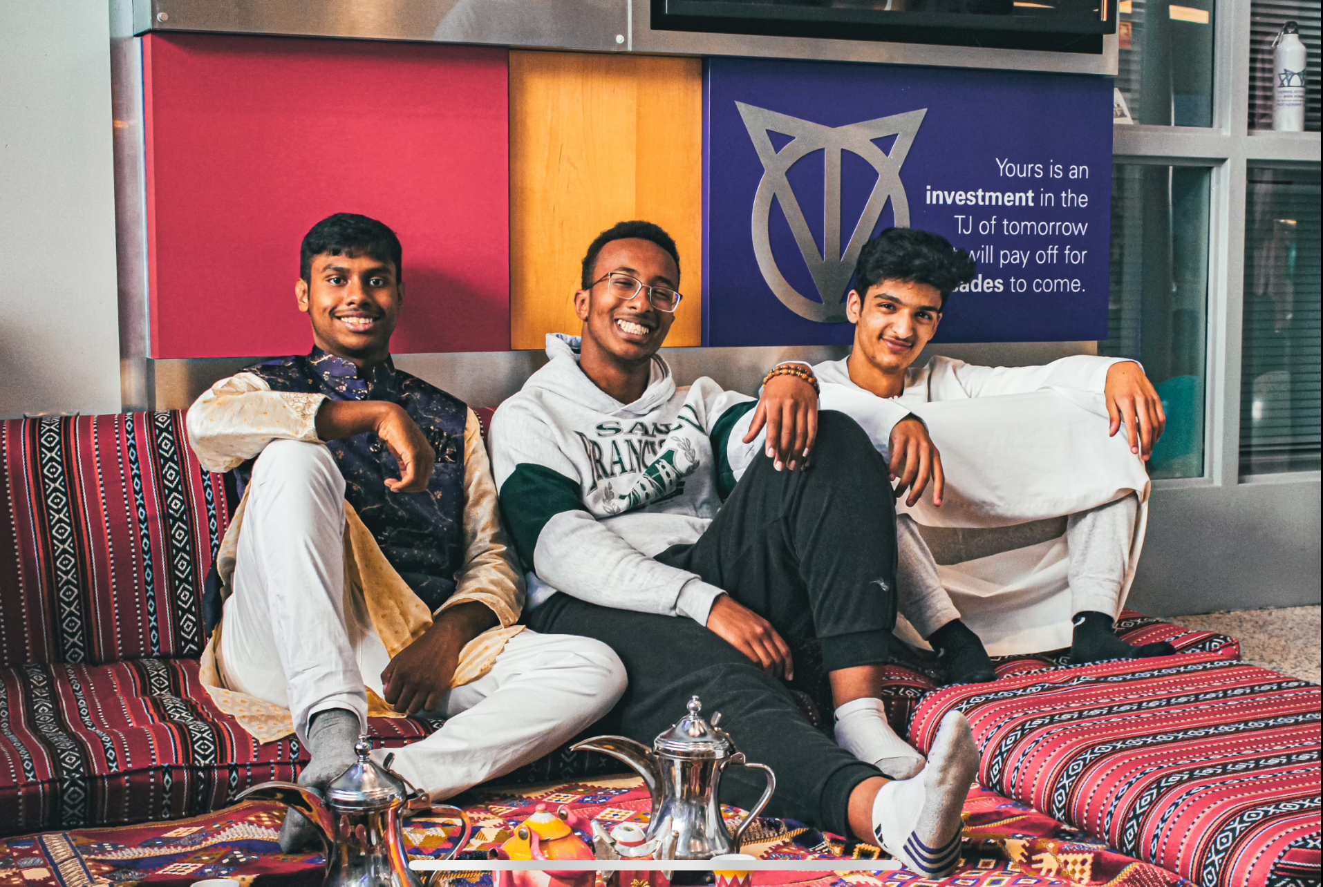 Seated on the left, sophomore Arbar Sharif participates in the Eid al-Fitr celebration in Nobel Commons. “Usually [during Eid], my family goes to a bunch of parties. You just have a good time, go around places and try to enjoy the time because it only happens twice a year. It's pretty important,” Sharif said. 