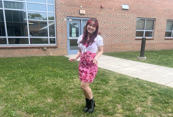 Showcasing an outfit thrifted from YesStyle, an online clothing brand, junior Celeste Tran features her monochromatic floral dress. “I find that thrifting my outfits can save me a lot of money in the future. I also think that thrift stores are looked down upon a lot, but I believe that there are pretty good finds in them,” Tran said.