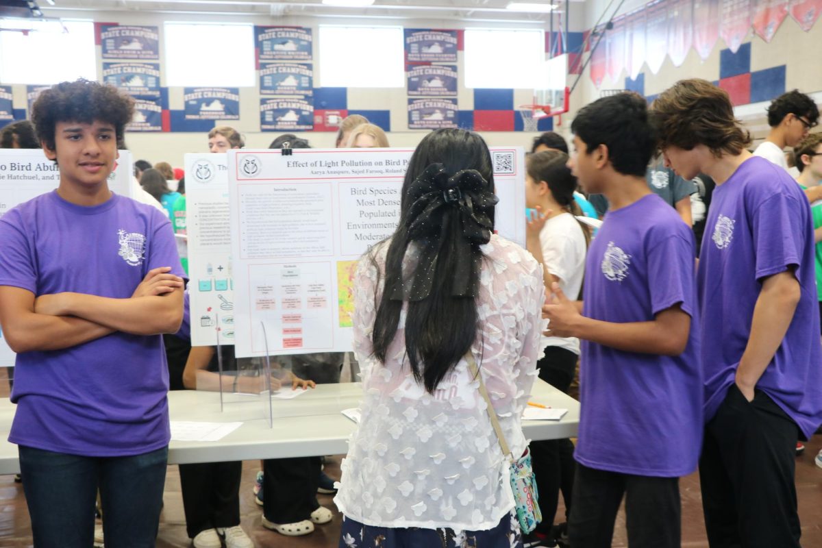 Standing next to his poster, freshman Aarya Anaspure proudly waits to answer any questions about his group’s project. Jefferson is one of the only schools that offer a year-long research project in freshman year. “The IBEST project was one of the most unique and collaborative projects I worked on, and it taught me skills that I would use for many years to come. The project was challenging and communication was difficult at times, however, working together with friends strengthened our collaborative skills, and getting to output an actual result with our hard work felt good,” Anaspure said. 