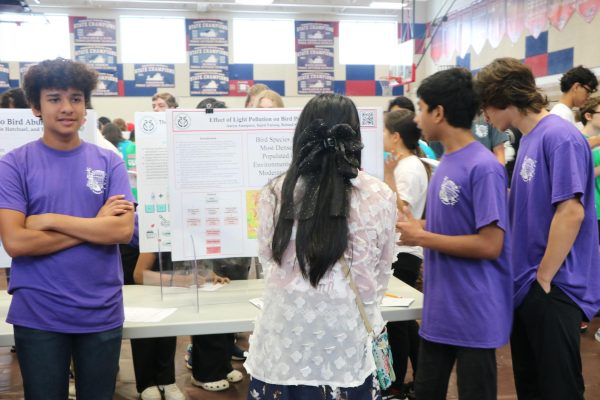 Standing next to his poster, freshman Aarya Anaspure proudly waits to answer any questions about his group’s project. Jefferson is one of the only schools that offer a year-long research project in freshman year. “The IBEST project was one of the most unique and collaborative projects I worked on, and it taught me skills that I would use for many years to come. The project was challenging and communication was difficult at times, however, working together with friends strengthened our collaborative skills, and getting to output an actual result with our hard work felt good,” Anaspure said. 