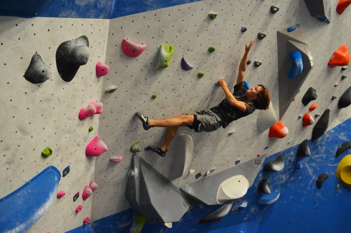 Sophomore Isaac Tennyson reaches for a rock to grab, holding himself in the air. “What’s amazing about rock climbing is, as a sport, it’s very much about problem solving. So if you go to [Jefferson], a lot of [Jefferson] is solving problems, right? And when you are rock climbing, your goal is to solve a problem on the wall,” Tennyson said.