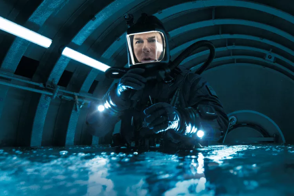 Ethan Hunt (Tom Cruise) prepares to go retrieve the Entity's source code in a specially designed underwater suit. 