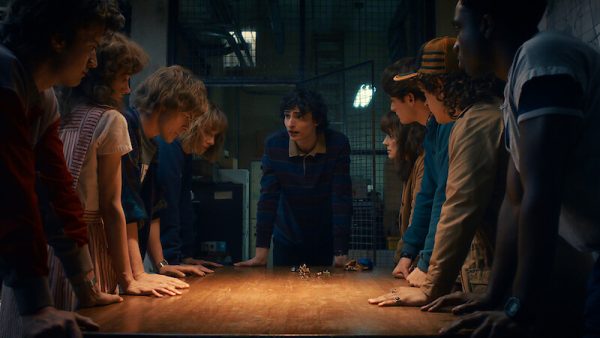 The crew discusses the plan to save children from Vecna and Demogorgon. 