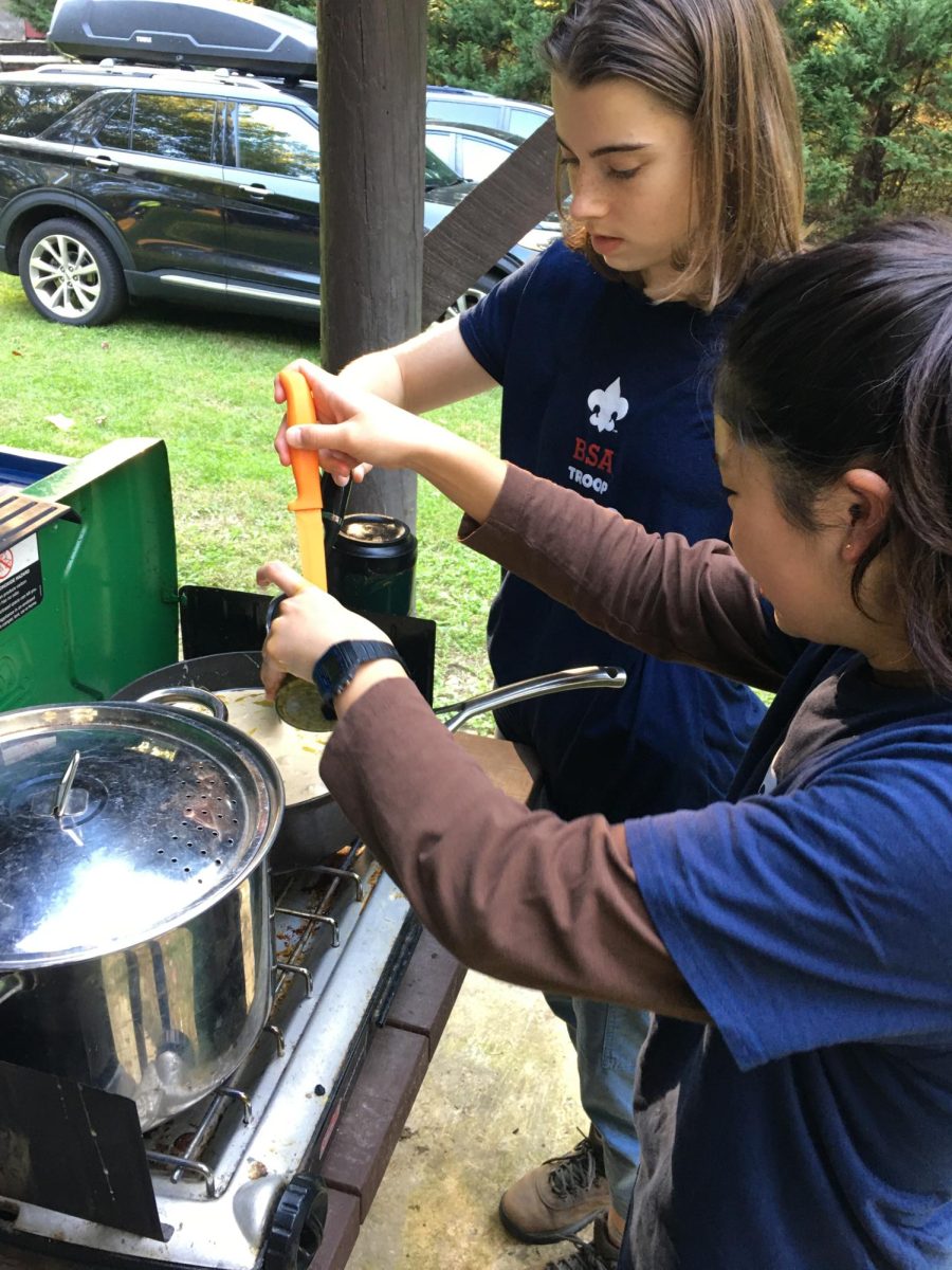 Troop events, like campouts, help the scouts practice skills they have learned and connect with other scouts. In October of 2024, Eagle scouts were holding one of their regular cookouts. “Cooking with my troop is definitely a time for bonding, especially as I teach younger scouts our signature troop recipes like breakfast hash and dutch oven stew,” senior Juliet Phillips said. “Our campouts are also a time for scout development, with leaders guiding new scouts through activities, and everyone gets closer as we work together.”