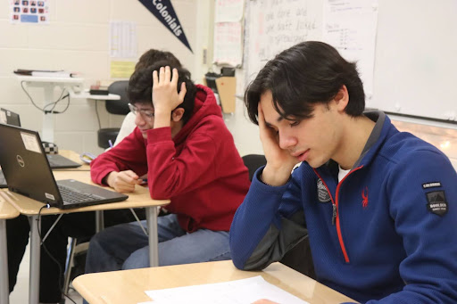 Junior Sebastian Garcia Gaytan and sophomore Mahmoud Belhamdi work stressed and overcome by negative emotions. 
