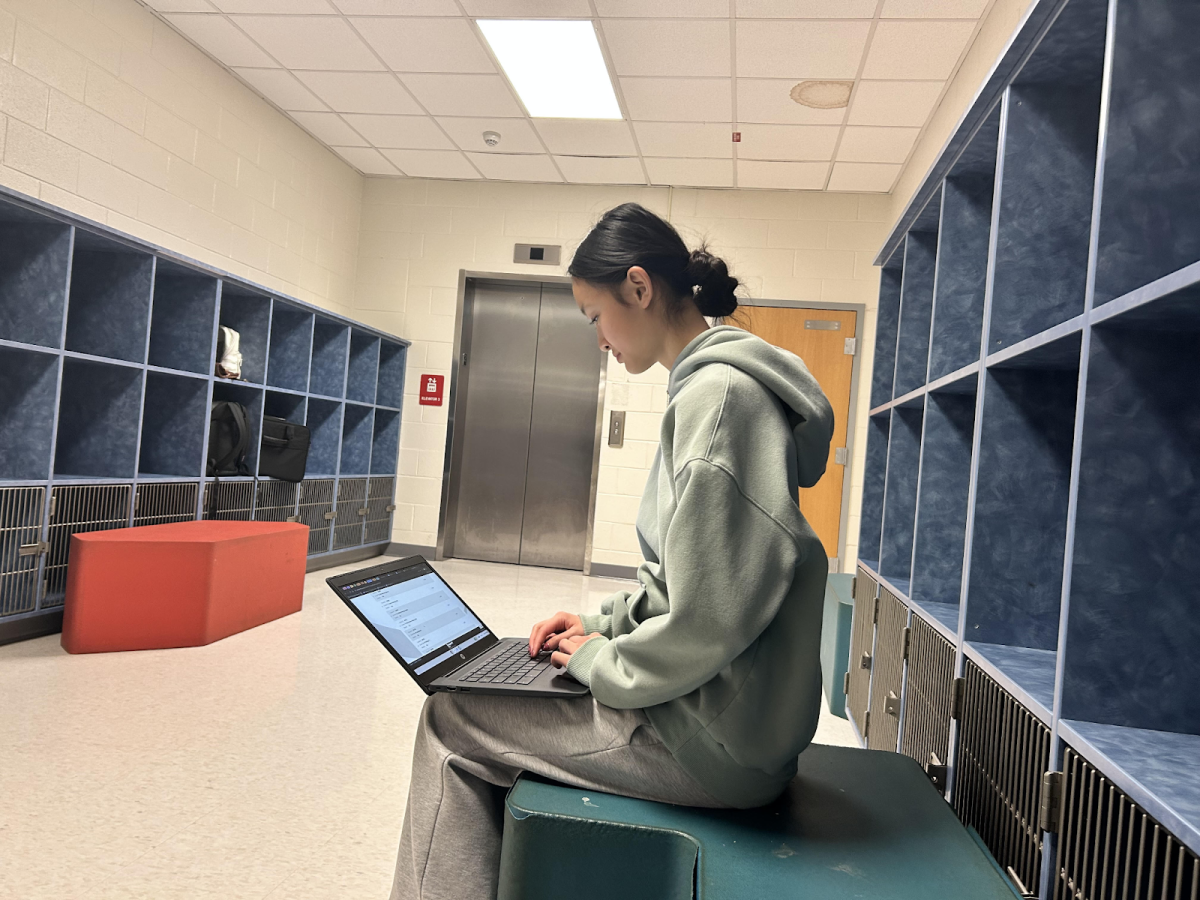 Freshman Alice Deng selects her classes through StudentVue. Despite being a freshman, Deng has a multitude of ideas for pursuing different course-ways. “I hope to learn more about [research] and [chemistry] because I'm taking two sciences,” Deng said.